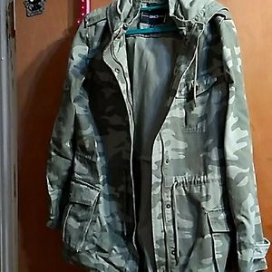 Camouflage jacket with hood.